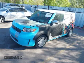 2008 Scion xB with VIN JTLKE50E381009787, listed as a IAAI auction lot 42140006 with 133,106 mi miles. Bid and sale history available at carsss.com. Image 2.