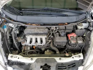 2009 Honda Fit Sport with VIN JHMGE88419S026712, listed as a Copart auction lot 51165865 with 54,586 mi miles and Salvage Title. Bid and sale history available at carsss.com. Image 12.