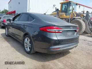 2018 Ford Fusion SE with VIN 3FA6P0HD8JR277127, listed as a IAAI auction lot 42040109 with 118,795 mi miles. Bid and sale history available at carsss.com. Image 3.
