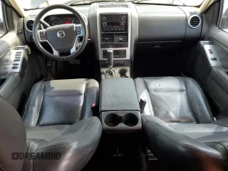 2010 Mercury Mountaineer z VIN 4M2EN3HE2AUJ07385, wystawiony jako Copart lot #51235735 z przebiegiem 174 742 mil mil oraz Szkoda całkowita • Salvage title. Historia ofert i sprzedaży dostępna na DreamBid. Obrazek 8.