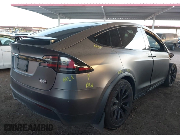2022 Tesla Model X Plaid z VIN 7SAXCBE69NF352875, wystawiony jako IAAI lot #41964970 z przebiegiem 34 065 mil mil oraz . Historia ofert i sprzedaży dostępna na DreamBid. Obrazek 20.
