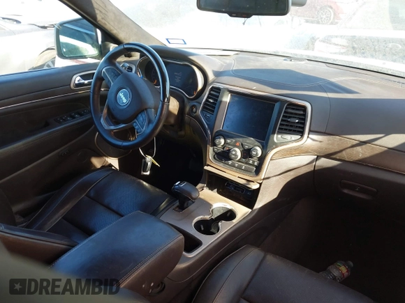 2014 Jeep Grand Cherokee Summit с VIN 1C4RJEJG4EC490624, выставлен на аукционе IAAI как лот 41341713 с пробегом 74 100 миль миль и . История ставок и продаж доступна на DreamBid. Изображение 5.