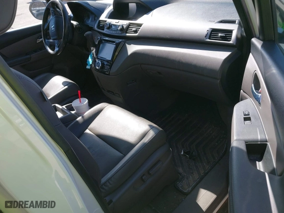 2016 Honda Odyssey EX-L with VIN 5FNRL5H69GB088577, listed as a IAAI auction lot 41768752 with 157,058 mi miles. Bid and sale history available at carsss.com. Image 5.