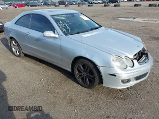 2009 Mercedes-Benz CLK 350 with VIN WDBTJ56H89F266069, listed as a IAAI auction lot 41993748 with 141,828 mi miles and . Bid and sale history available at DreamBid. Image 1.