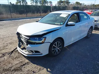 2018 Volkswagen Jetta 1.4T SE with VIN 3VWDB7AJ5JM217180, listed as a IAAI auction lot 41264730 with 63,509 mi miles. Bid and sale history available at carsss.com. Image 19.