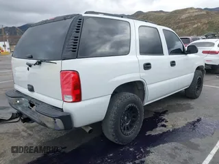 2005 Chevrolet Tahoe LS with VIN 1GNEC13V85J243672, listed as a IAAI auction lot 41801268 with 202,624 mi miles. Bid and sale history available at carsss.com. Image 4.
