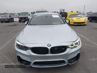 2018 BMW M4 with VIN WBS4Z9C50JED22690, listed as a IAAI auction lot 42439194 with 61,928 mi miles and . Bid and sale history available at DreamBid. Image 12.