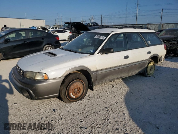 1996 Subaru Legacy Outback with VIN 4S3BG6857T7386841, listed as a Copart auction lot 70968724 with 122,232 mi miles and Salvage title. Bid and sale history available at DreamBid. Image 1.
