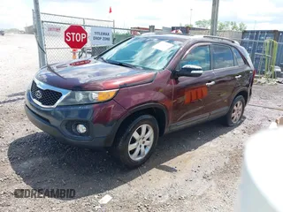 2011 Kia Sorento LX with VIN 5XYKT4A13BG044196, listed as a IAAI auction lot 42080972 with 292,004 mi miles. Bid and sale history available at carsss.com. Image 2.