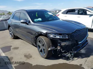2022 Genesis GV70 Sport z VIN KMUMCDTC3NU011481, wystawiony jako IAAI lot #42019461 z przebiegiem 25 878 mil mil oraz . Historia ofert i sprzedaży dostępna na DreamBid. Obrazek 1.