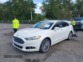 2016 Ford Fusion Titanium with VIN 3FA6P0K96GR400436, listed as a IAAI auction lot 42191256 with 128,447 mi miles and . Bid and sale history available at DreamBid. Image 2.