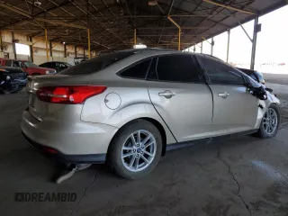 2017 Ford Focus SE with VIN 1FADP3F27HL303378, listed as a Copart auction lot 51862925 with 98,464 mi miles and Salvage Title. Bid and sale history available at DreamBid. Image 3.