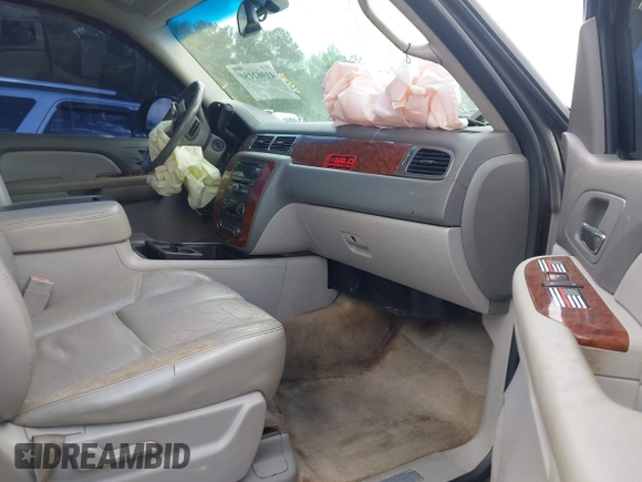 2007 Chevrolet Tahoe LTZ with VIN 1GNFK13037J115628, listed as a IAAI auction lot 41962150 with Not provided miles and . Bid and sale history available at DreamBid. Image 5.