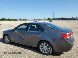 2012 Lincoln MKZ Hybrid z VIN 3LNDL2L33CR812788, wystawiony jako Copart lot #61068125 z przebiegiem 246 016 mil mil oraz Szkoda całkowita • Salvage title. Historia ofert i sprzedaży dostępna na DreamBid. Obrazek 2.
