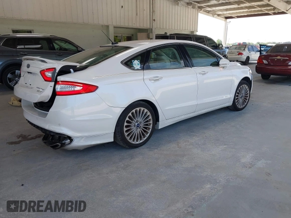 2016 Ford Fusion Titanium with VIN 3FA6P0K96GR390989, listed as a IAAI auction lot 42634275 with 123,559 mi miles and . Bid and sale history available at DreamBid. Image 4.