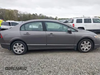 2009 Honda Civic LX z VIN 1HGFA16539L005299, wystawiony jako IAAI lot #41848263 z przebiegiem 169 019 mil mil oraz . Historia ofert i sprzedaży dostępna na DreamBid. Obrazek 13.