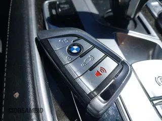 2016 BMW 7 Series 740i with VIN WBA7E2C54GG714649, listed as a IAAI auction lot 41815220 with 89,029 mi miles. Bid and sale history available at carsss.com. Image 11.