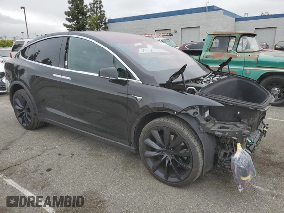 2020 Tesla Model X Long Range with VIN 5YJXCDE23LF248773, listed as a Copart auction lot 53062405 with 62,342 mi miles and Salvage Title. Bid and sale history available at carsss.com. Image 4.