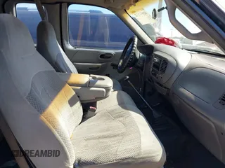 1999 Ford F-150 z VIN 1FTZX1725XKA26611, wystawiony jako IAAI lot #42037812 z przebiegiem Nie podano mil oraz . Historia ofert i sprzedaży dostępna na DreamBid. Obrazek 5.