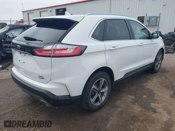 2020 Ford Edge SEL with VIN 2FMPK4J9XLBA93315, listed as a IAAI auction lot 42073323 with 103,210 mi miles and . Bid and sale history available at DreamBid. Image 4.