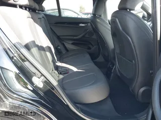 2019 BMW X2 xDrive28i with VIN WBXYJ5C52K5N24828, listed as a IAAI auction lot 41155049 with 59,597 mi miles. Bid and sale history available at carsss.com. Image 8.