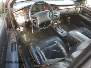 1999 Cadillac Eldorado Touring z VIN 1G6ET1298XU602343, wystawiony jako Copart lot #44327195 z przebiegiem 52 327 mil mil oraz Szkody całkowita. Historia ofert i sprzedaży dostępna na DreamBid. Obrazek 8.