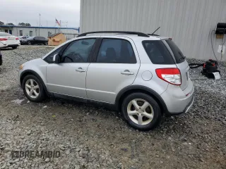 2009 Suzuki SX4 with VIN JS2YB413195101423, listed as a Copart auction lot 85321624 with 127,917 mi miles and Salvage Title. Bid and sale history available at carsss.com. Image 2.
