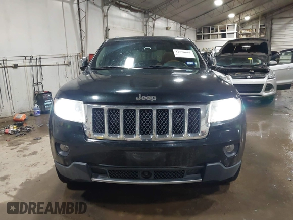 2013 Jeep Grand Cherokee Overland with VIN 1C4RJECT4DC526465, listed as a IAAI auction lot 41570663 with 116,948 mi miles. Bid and sale history available at carsss.com. Image 12.