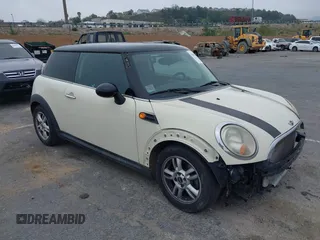 2011 MINI Hardtop with VIN WMWSU3C50BT093428, listed as a IAAI auction lot 41895788 with 173,501 mi miles and . Bid and sale history available at DreamBid. Image 1.