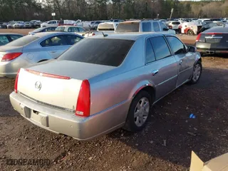 2006 Cadillac DTS w/1SC with VIN 1G6KD57Y26U104838, listed as a IAAI auction lot 41280412 with 172,494 mi miles. Bid and sale history available at carsss.com. Image 4.