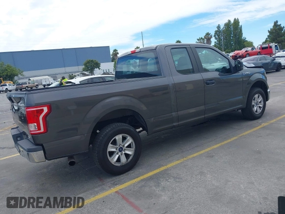 2015 Ford F-150 XL with VIN 1FTEX1CF7FKE65881, listed as a IAAI auction lot 42809438 with 122,541 mi miles and . Bid and sale history available at DreamBid. Image 4.