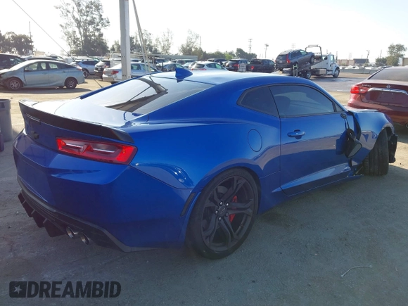 2018 Chevrolet Camaro 1SS with VIN 1G1FE1R78J0131642, listed as a IAAI auction lot 41970560 with 34,140 mi miles and . Bid and sale history available at DreamBid. Image 4.