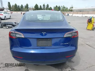 2021 Tesla Model 3 Long Range with VIN 5YJ3E1EB6MF878411, listed as a IAAI auction lot 41986947 with 71,978 mi miles and . Bid and sale history available at DreamBid. Image 17.