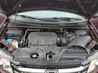 2014 Honda Odyssey LX z VIN 5FNRL5H24EB098072, wystawiony jako Copart lot #57577385 z przebiegiem 215 069 mil mil oraz Szkoda całkowita • Salvage title. Historia ofert i sprzedaży dostępna na DreamBid. Obrazek 12.