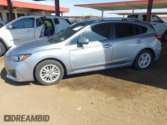 2017 Subaru Impreza Premium z VIN 4S3GTAB69H3703779, wystawiony jako IAAI lot #42151284 z przebiegiem 135 455 mil mil oraz . Historia ofert i sprzedaży dostępna na DreamBid. Obrazek 17.