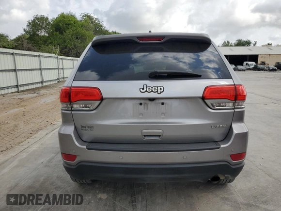 2017 Jeep Grand Cherokee Laredo with VIN 1C4RJEAG0HC664063, listed as a Copart auction lot 54850295 with 82,913 mi miles and Salvage title. Bid and sale history available at DreamBid. Image 6.