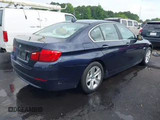 2013 BMW 5 Series 528i xDrive with VIN WBAXH5C52DD115352, listed as a IAAI auction lot 42501265 with 122,421 mi miles and . Bid and sale history available at DreamBid. Image 4.