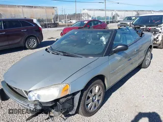 2004 Chrysler Sebring Limited with VIN 1C3EL65R24N295199, listed as a IAAI auction lot 41463140 with Not Provided miles and . Bid and sale history available at DreamBid. Image 2.