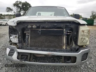 2014 Ford F-250 XLT with VIN 1FT7X2A65EEA98638, listed as a Copart auction lot 60948084 with 319,812 mi miles and Salvage title. Bid and sale history available at DreamBid. Image 5.