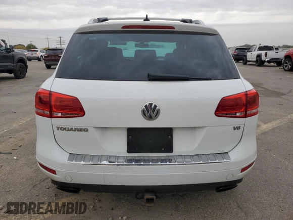 2014 Volkswagen Touareg Sport with VIN WVGEF9BP3ED005921, listed as a Copart auction lot 77372514 with 156,753 mi miles and Salvage Title. Bid and sale history available at DreamBid. Image 6.