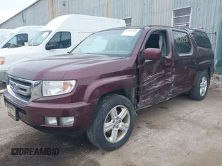 2011 Honda Ridgeline RTL with VIN 5FPYK1F51BB007959, listed as a IAAI auction lot 41894350 with 186,926 mi miles. Bid and sale history available at carsss.com. Image 17.