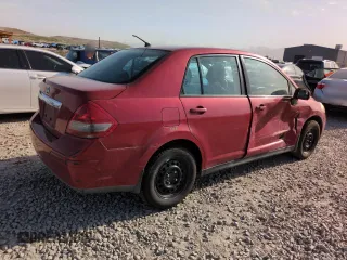 2010 Nissan Versa S z VIN 3N1BC1APXAL439022, wystawiony jako Copart lot #51972715 z przebiegiem 176 841 mil mil oraz Szkoda całkowita • Salvage title. Historia ofert i sprzedaży dostępna na DreamBid. Obrazek 3.