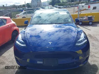 2022 Tesla Model Y Long Range with VIN 7SAYGDEE6NF318372, listed as a IAAI auction lot 41526857 with 26,083 mi miles and . Bid and sale history available at carsss.com. Image 12.