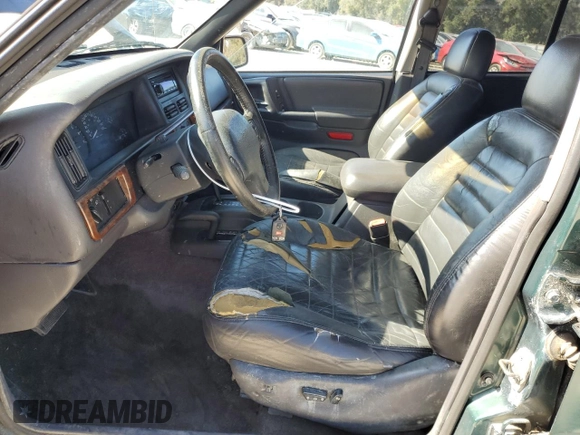 1996 Jeep Grand Cherokee Laredo with VIN 1J4GZ58S1TC340018, listed as a Copart auction lot 86571454 with 0 mi miles and Salvage Title. Bid and sale history available at carsss.com. Image 7.