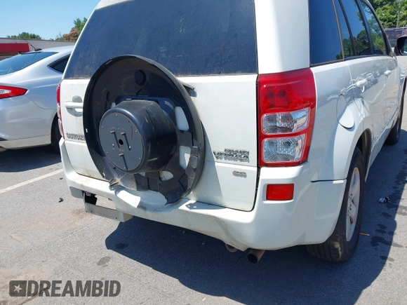 2011 Suzuki Grand Vitara Premium z VIN JS3TD0D2XB4103016, wystawiony jako IAAI lot #42568549 z przebiegiem 156 595 mil mil oraz . Historia ofert i sprzedaży dostępna na DreamBid. Obrazek 6.