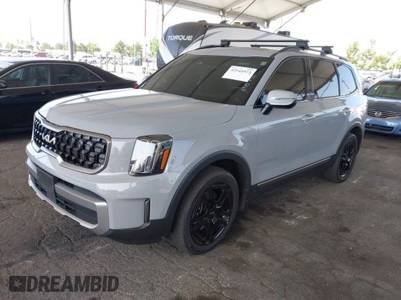 2023 Kia Telluride EX X-Line z VIN 5XYP3DGC0PG395945, wystawiony jako IAAI lot #42544923 z przebiegiem 19 046 mil mil oraz . Historia ofert i sprzedaży dostępna na DreamBid. Obrazek 17.