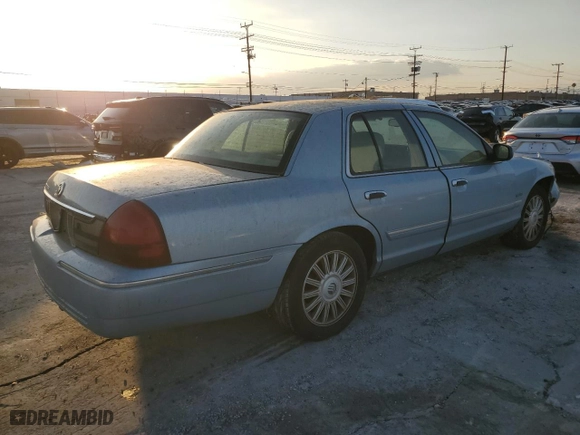 2011 Mercury Grand Marquis LS with VIN 2MEBM7FV5BX601111, listed as a Copart auction lot 44258165 with 129,960 mi miles and Salvage Title. Bid and sale history available at carsss.com. Image 3.