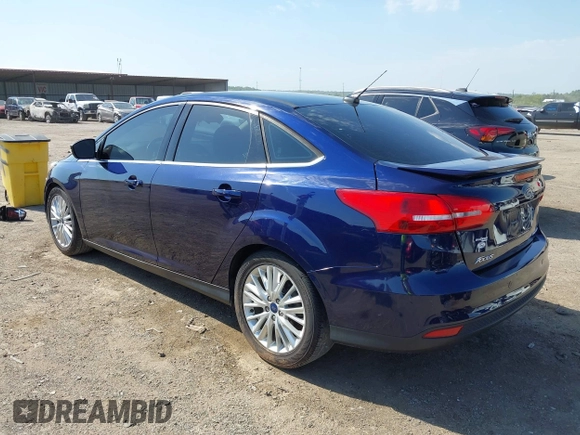 2017 Ford Focus Titanium with VIN 1FADP3J29HL204892, listed as a IAAI auction lot 42032705 with 119,028 mi miles and . Bid and sale history available at DreamBid. Image 3.