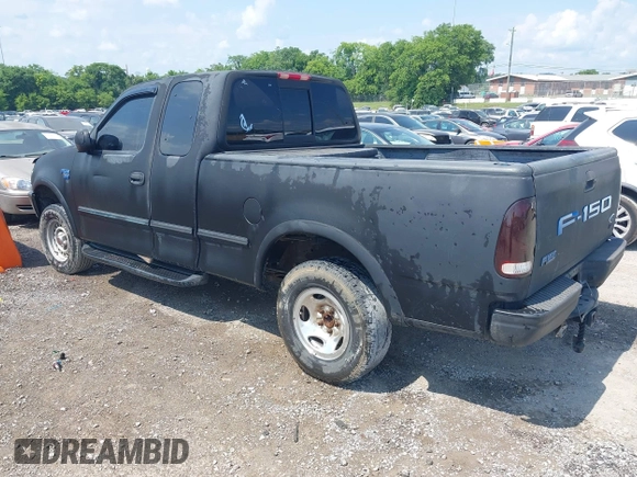 1998 Ford F-150 with VIN 1FTRX18L2WKA67414, listed as a IAAI auction lot 42583873 with 189,546 mi miles and . Bid and sale history available at DreamBid. Image 3.