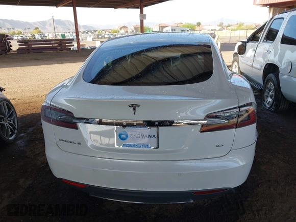 2014 Tesla Model S 60 with VIN 5YJSA1H14EFP63737, listed as a IAAI auction lot 41947610 with 62,240 mi miles and . Bid and sale history available at DreamBid. Image 16.